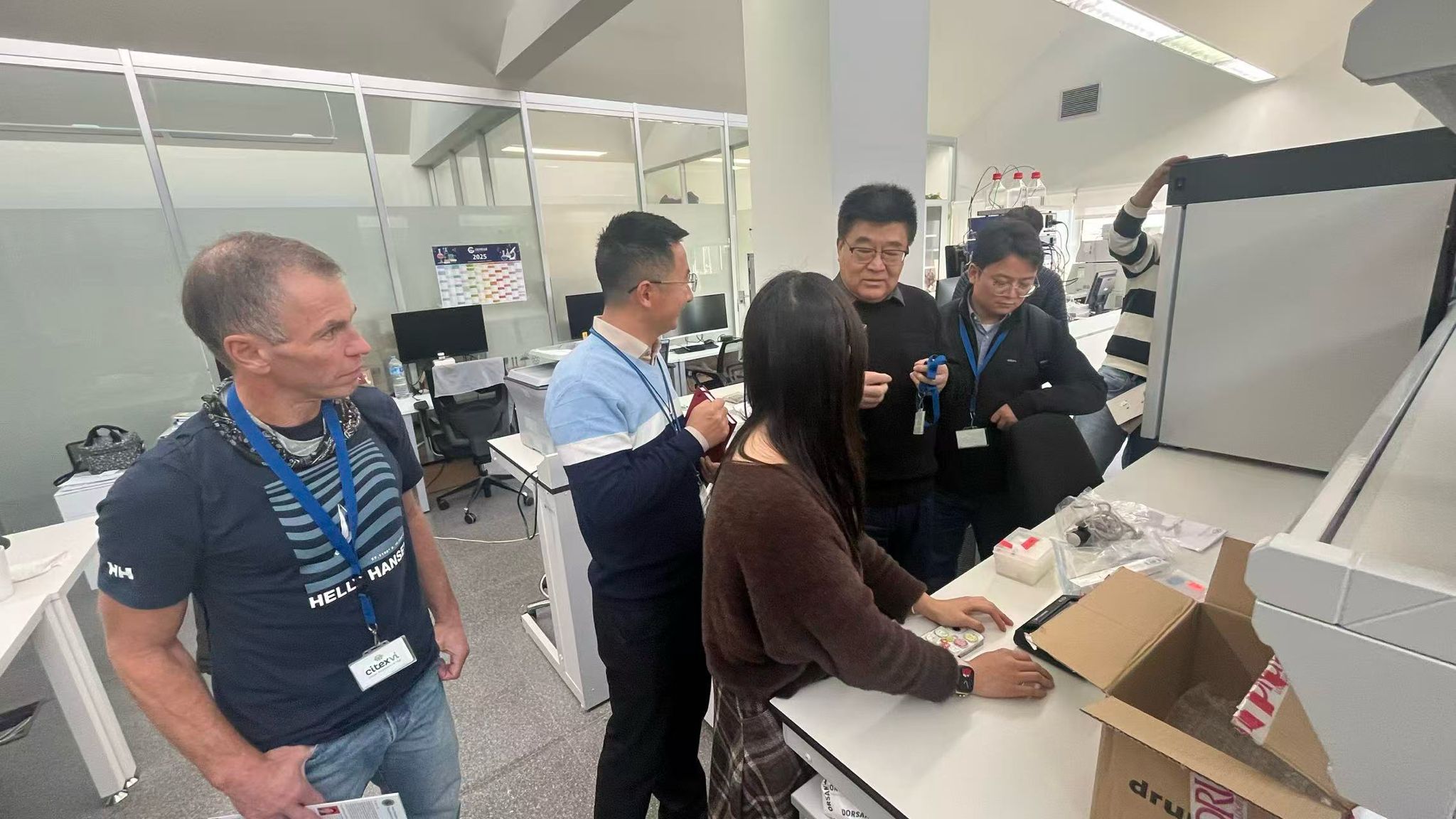 A picture of the visit of CAAS delegation to the laboratories managed by AA1 group