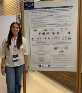 Sabela Fernández Sánchez with her poster ‘Valorization of brewing industry by-products: Characterization, extraction of bioactive compounds, and sustainable industrial applications’